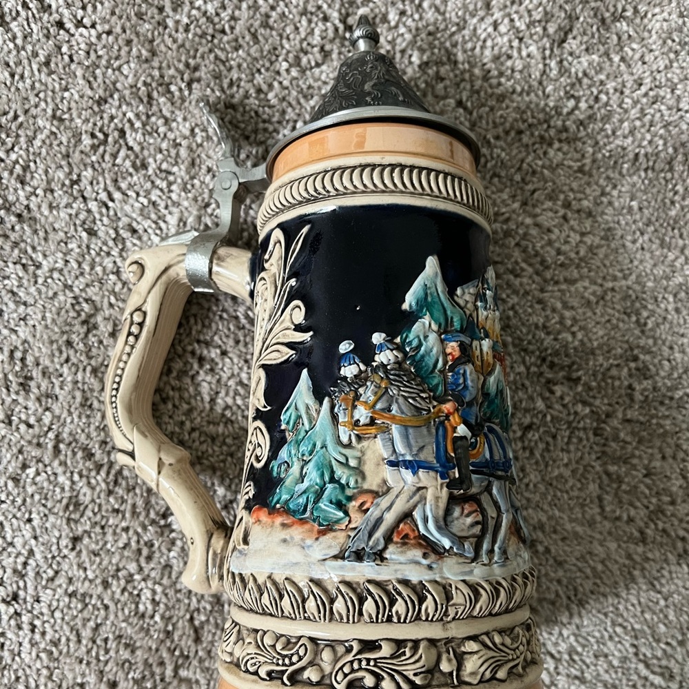 Antique collectible German beer stein - numbered and in excellent condition!